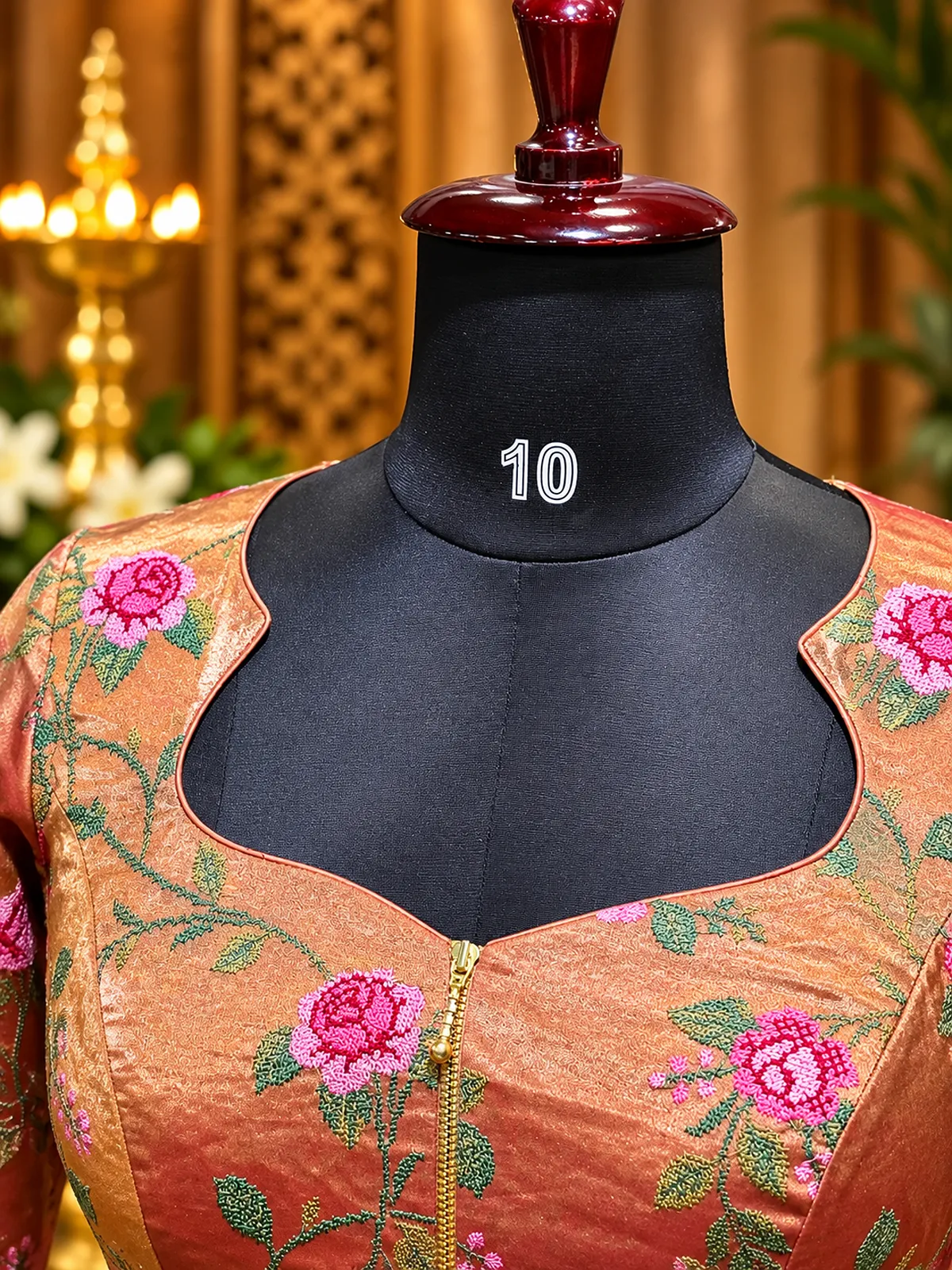 embroidered floral blouse on mannequin embroidered floral blouse on mannequin