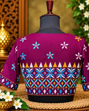 embroidered plum blouse display