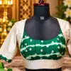 emerald and ivory silk blouse display