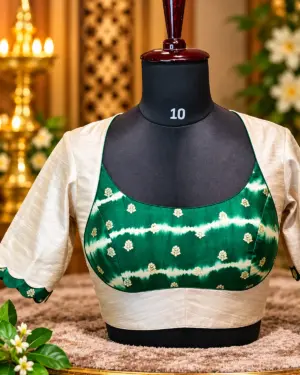 emerald and ivory silk blouse display