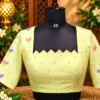 lemon floral blouse on mannequin lemon floral blouse on mannequin