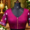 plum embroidered blouse on mannequin plum embroidered blouse on mannequin