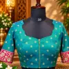 teal blouse with gold embroidery