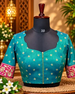 teal blouse with gold embroidery