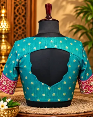 teal embroidered open back blouse display