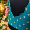 teal silk blouse with gold embroidery